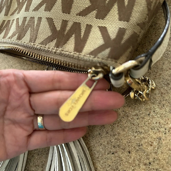 Michael Kors Monogram Drawstring Bucket Brown Mini WithTassel Crossbody Bag - Picture 4 of 14